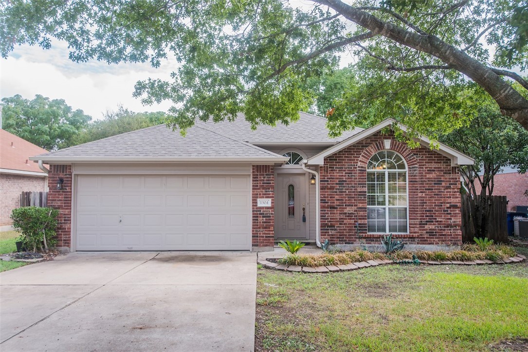 1304 River Oak Drive Leander, TX 78641 - Photo 1 of 1 a front view of house with yard and green space