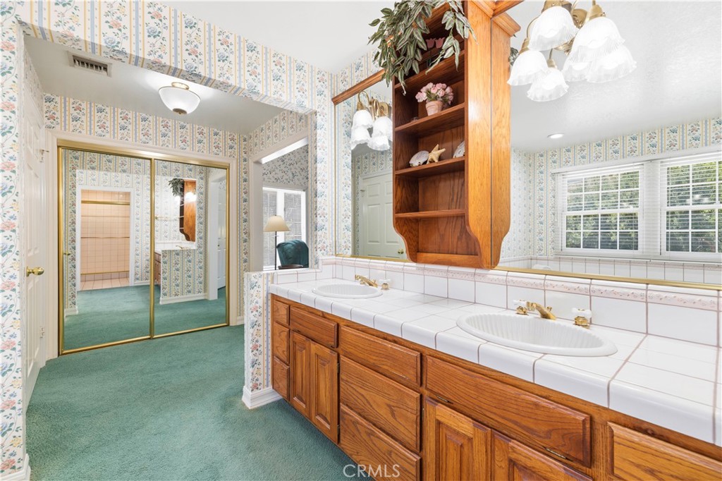 25707 Pacy Street Newhall, CA 91321 - Photo 40 of 62 primary bathroom and 1 of 2 closets