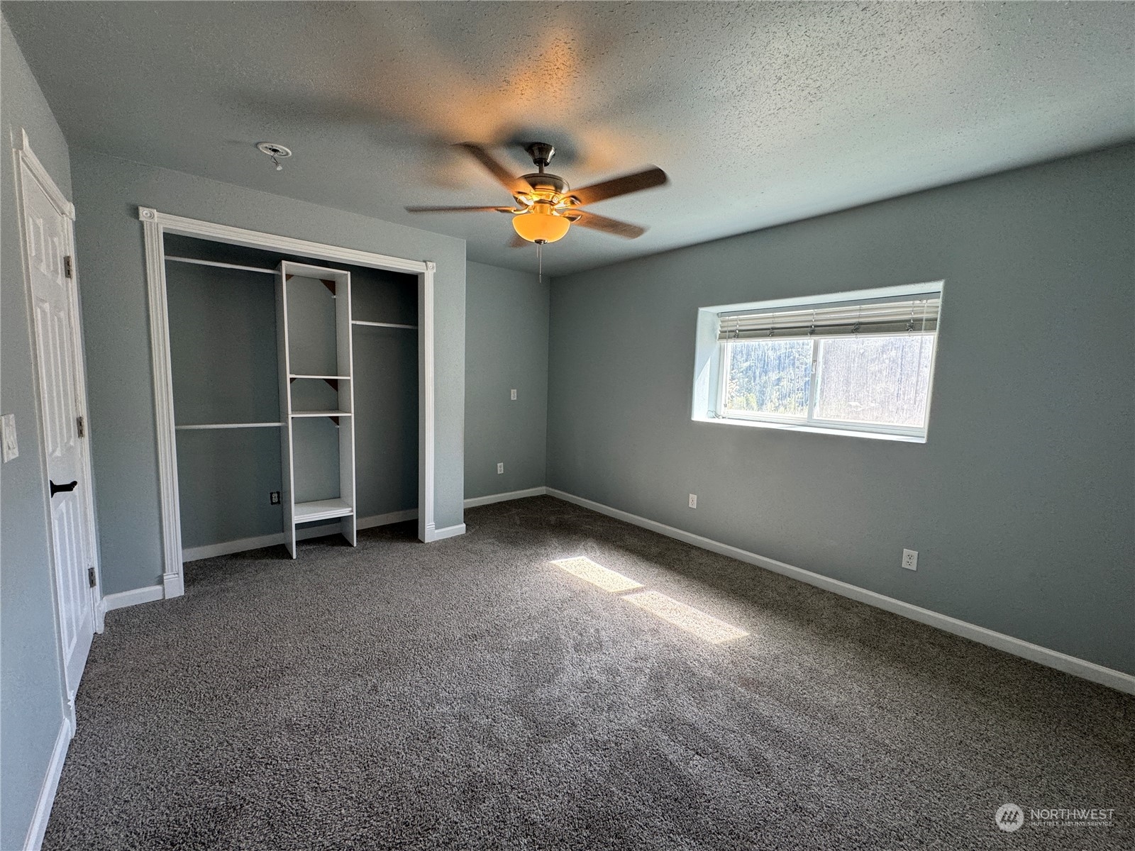 4 Eighme Road Oroville, WA 98844 - Photo 28 of 40 an empty room with closet and windows