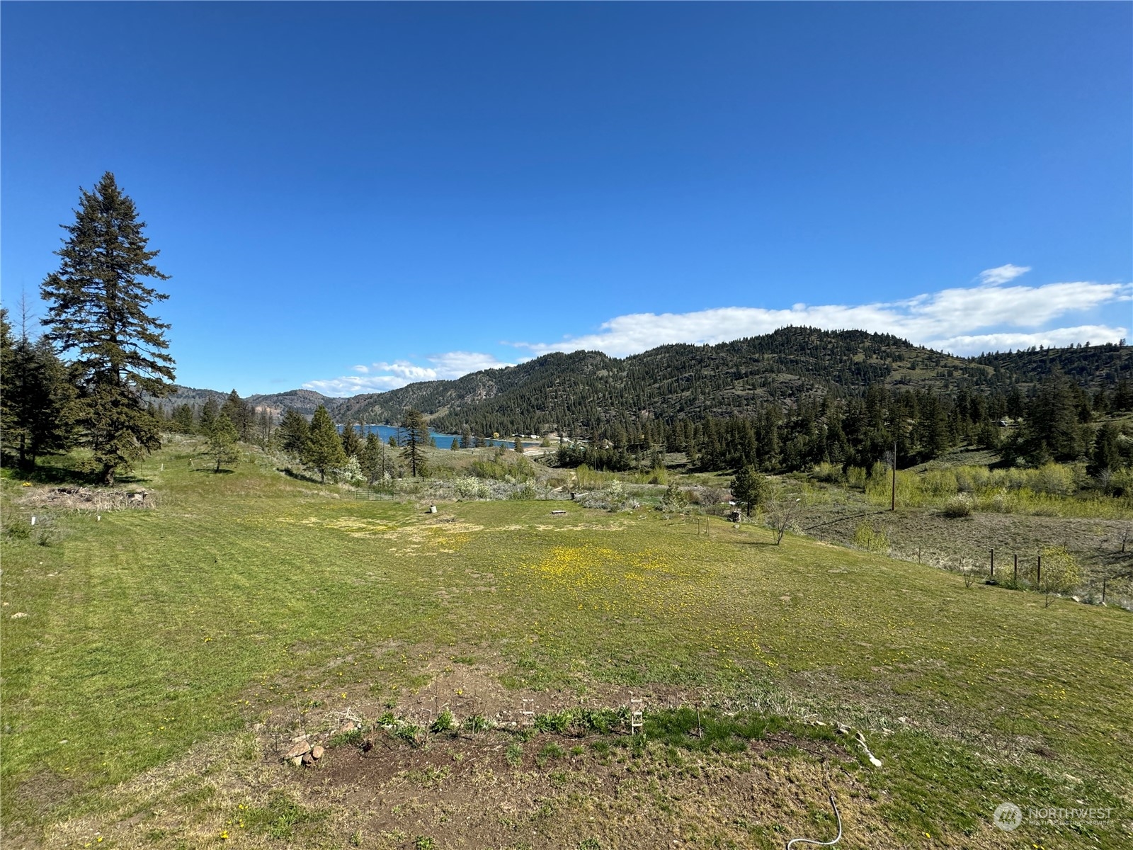 4 Eighme Road Oroville, WA 98844 - Photo 34 of 40 a view of an ocean and a mountain
