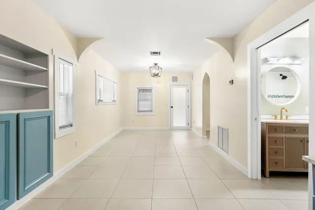 a view of a hallway with front door