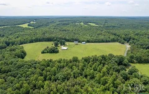 1002 Spring Grove Road Spout Spring, VA 24593 - Photo 54 of 63 an aerial view of a residential houses with outdoor space and trees all around