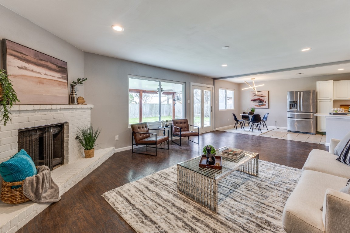 11105 Bending Bough Trail Austin, TX 78758 - Photo 1 of 1 a living room with furniture and a fireplace