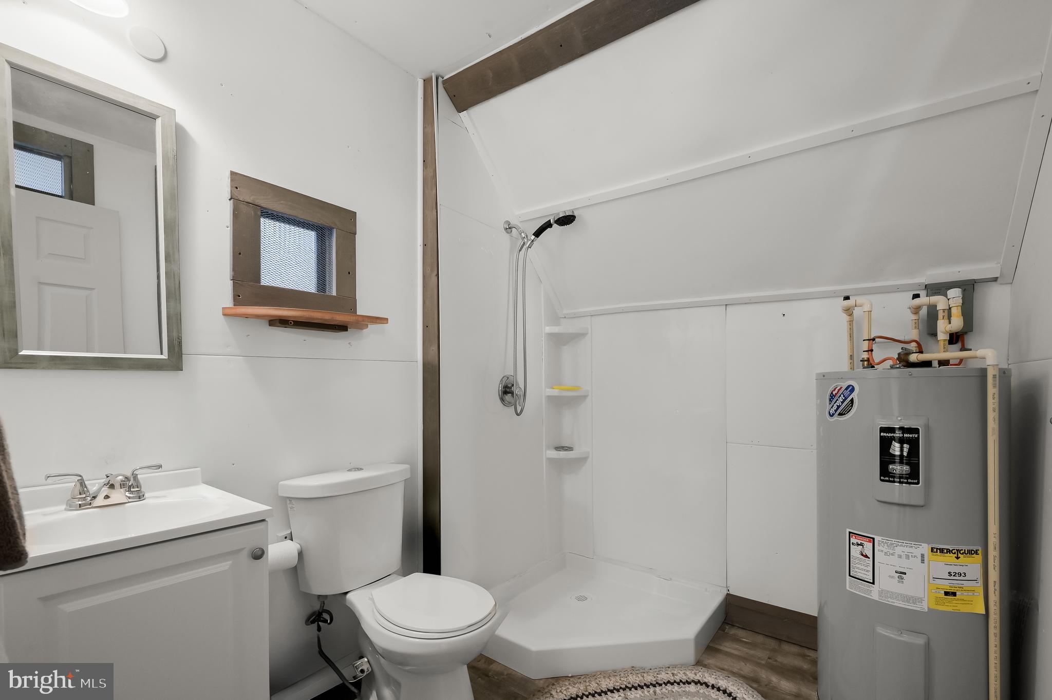 15101 Union Chapel Road Woodbine, MD 21797 - Photo 82 of 93 a bathroom with a sink a toilet and shower