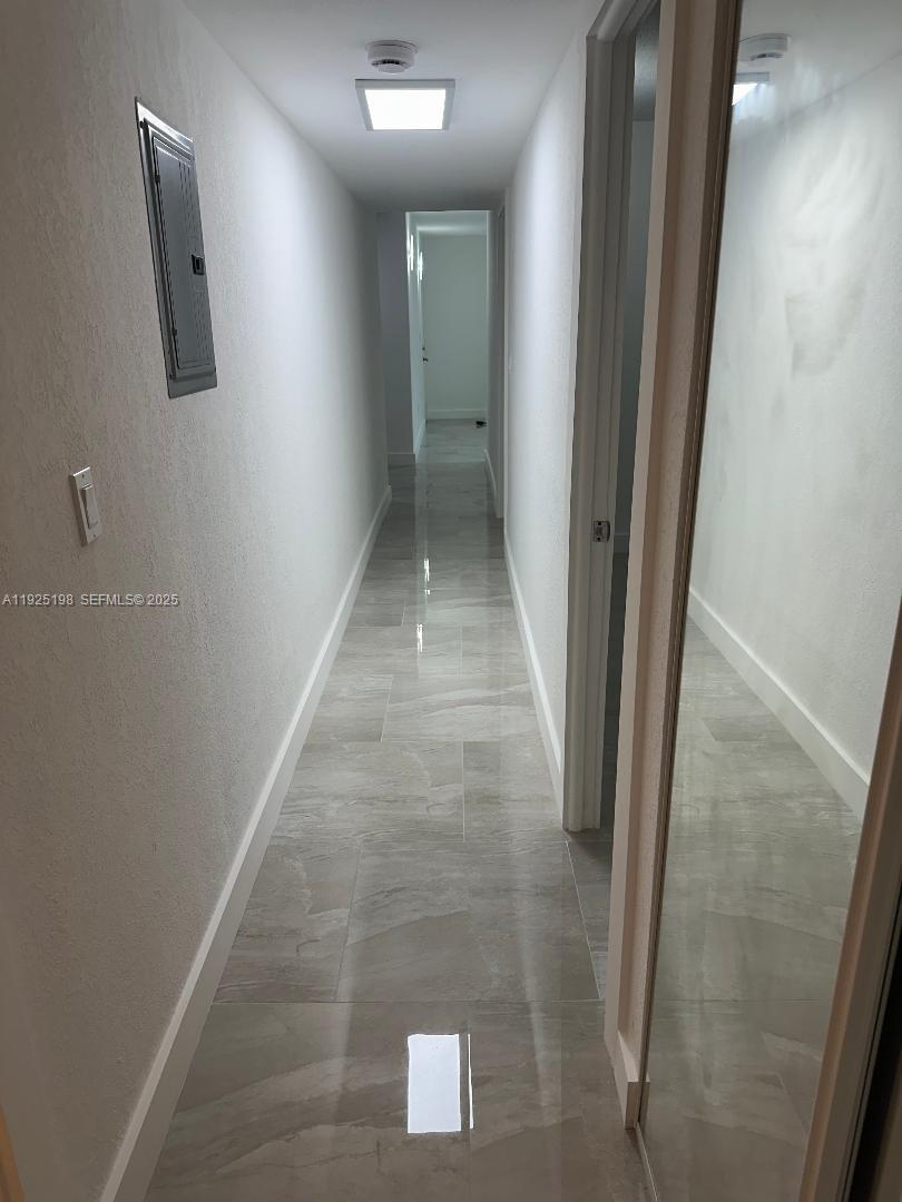748 82nd Street, Unit 1 Miami Beach, FL 33141 - Photo 9 of 10 a view of a hallway