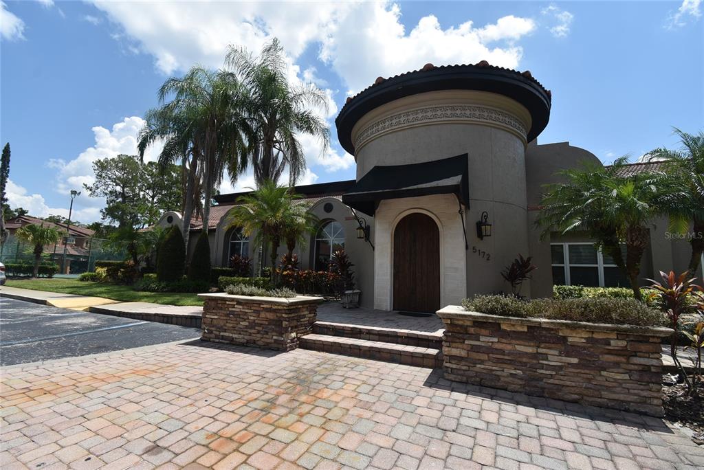 5160 Conroy Road, Unit 1435 Orlando, FL 32811 - Photo 15 of 18 a front view of a house with garden