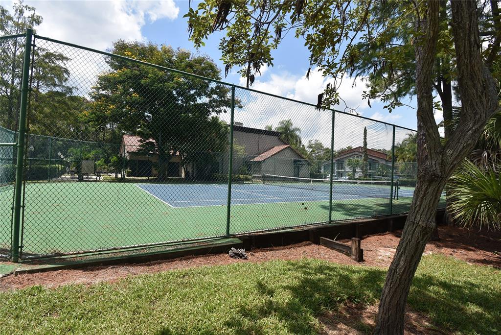 5160 Conroy Road, Unit 1435 Orlando, FL 32811 - Photo 16 of 18 a view of a backyard