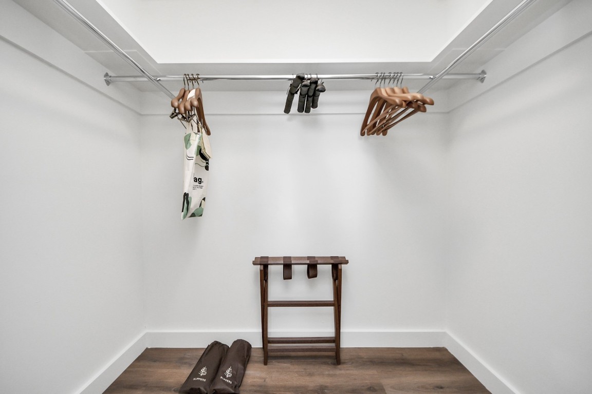 1300 Lamar Street, Unit T3 Houston, TX 77010 - Photo 27 of 49 a view of walk in closet with clothes and shoes