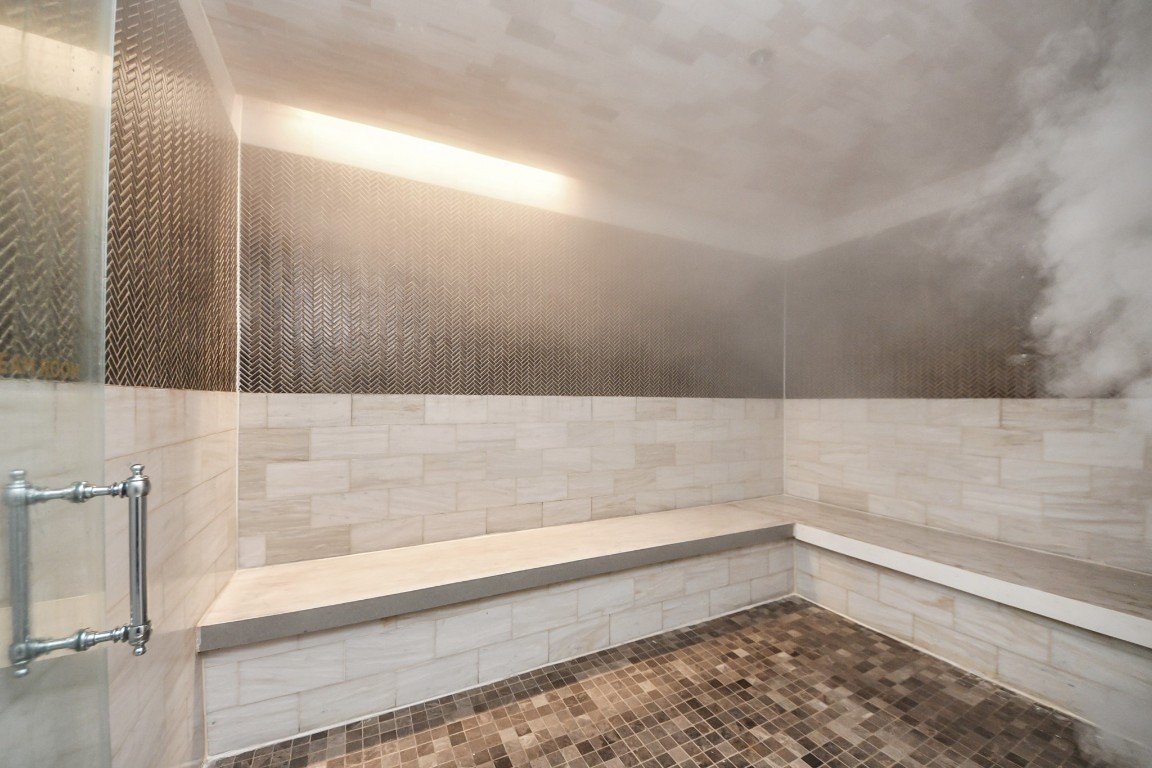 1300 Lamar Street, Unit T3 Houston, TX 77010 - Photo 44 of 49 a bathroom with a bathtub and a shower