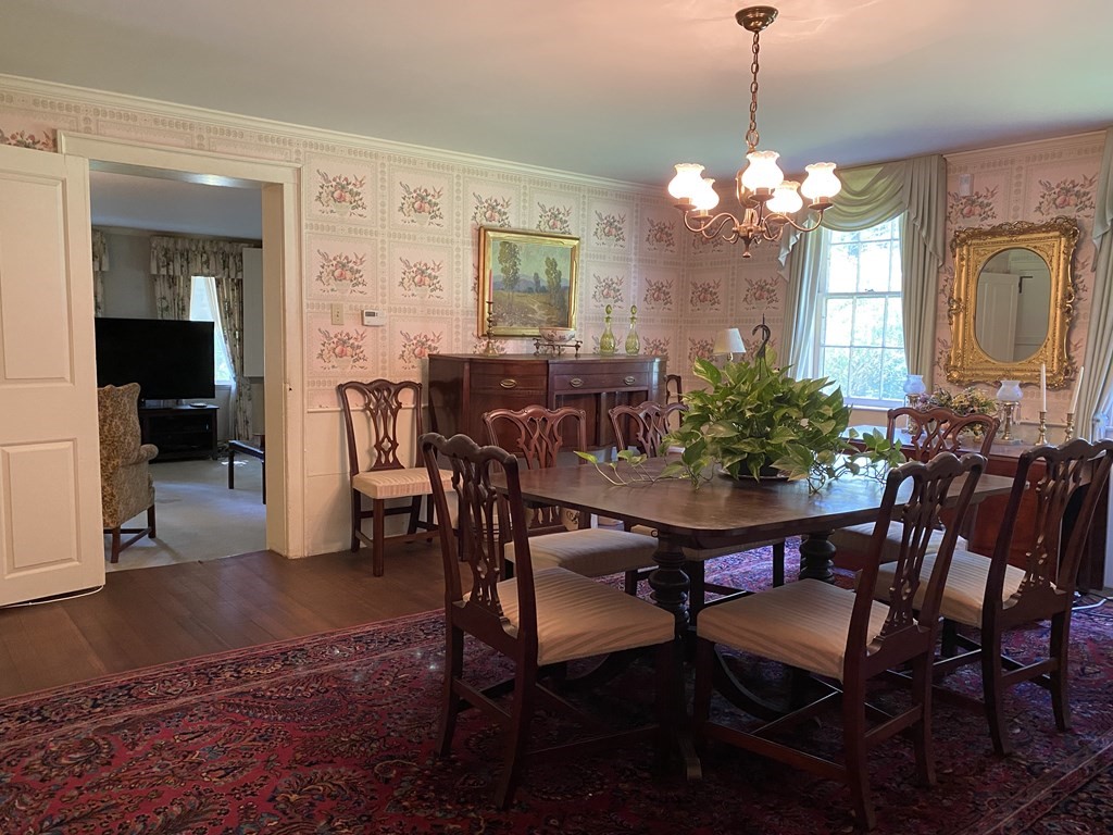 100 Brattleboro Road Bernardston, MA 01337 - Photo 12 of 42 a view of a dining room with furniture and chandelier
