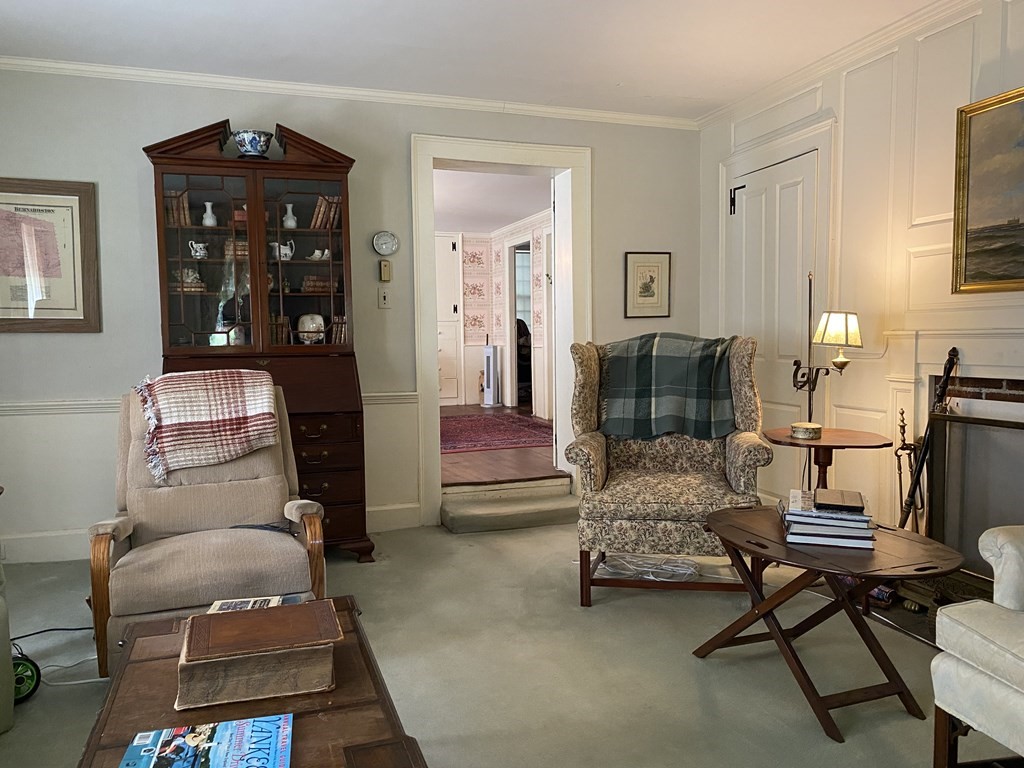 100 Brattleboro Road Bernardston, MA 01337 - Photo 14 of 42 a bedroom with a bed and wooden floor