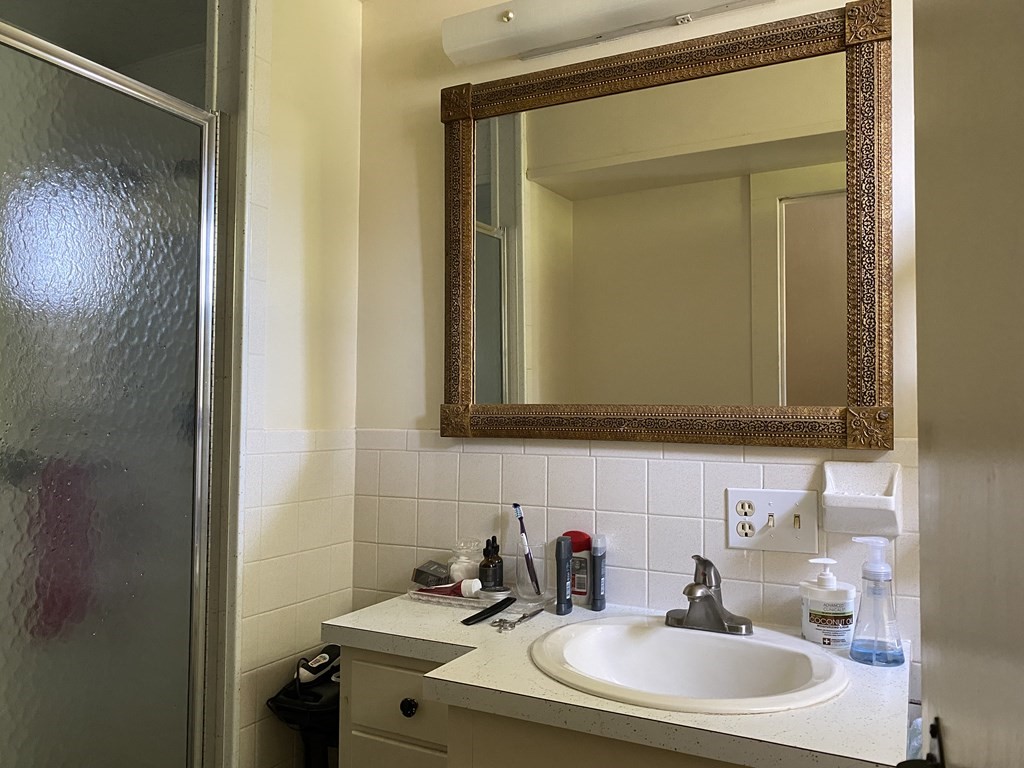 100 Brattleboro Road Bernardston, MA 01337 - Photo 16 of 42 a bathroom with a sink and a mirror
