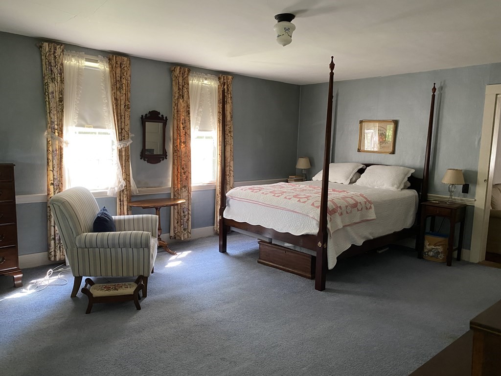 100 Brattleboro Road Bernardston, MA 01337 - Photo 18 of 42 a bed room with a bed and a couch