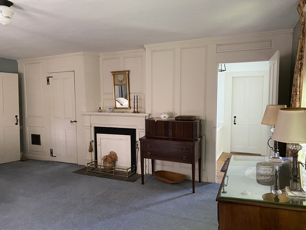 100 Brattleboro Road Bernardston, MA 01337 - Photo 19 of 42 a living room with furniture and a fireplace