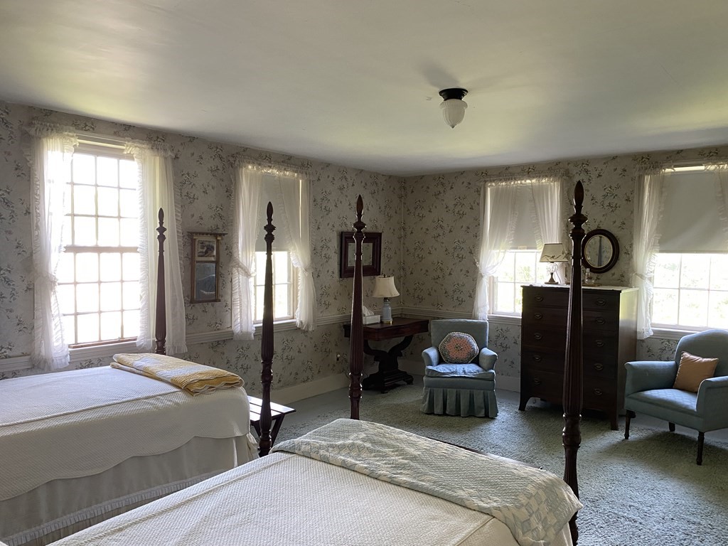 100 Brattleboro Road Bernardston, MA 01337 - Photo 22 of 42 a bedroom with a bed and furniture