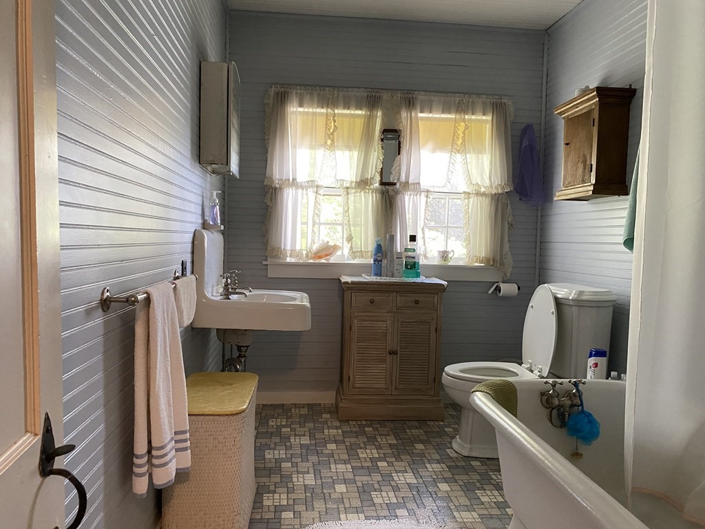 100 Brattleboro Road Bernardston, MA 01337 - Photo 26 of 42 a bathroom with a tub sink toilet and window