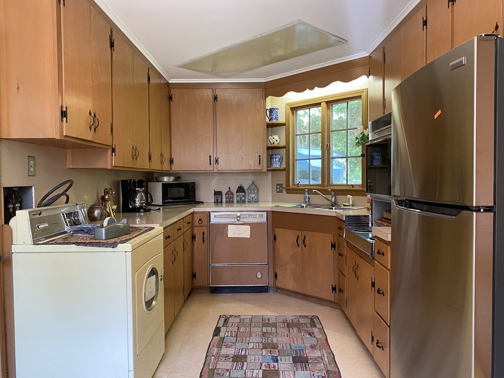 100 Brattleboro Road Bernardston, MA 01337 - Photo 28 of 42 a kitchen with a sink appliances cabinets and a window
