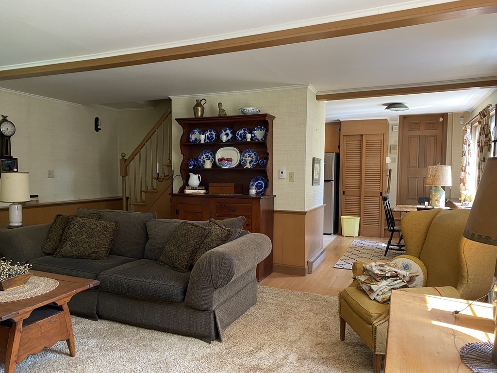 100 Brattleboro Road Bernardston, MA 01337 - Photo 30 of 42 a living room with furniture a rug and a window