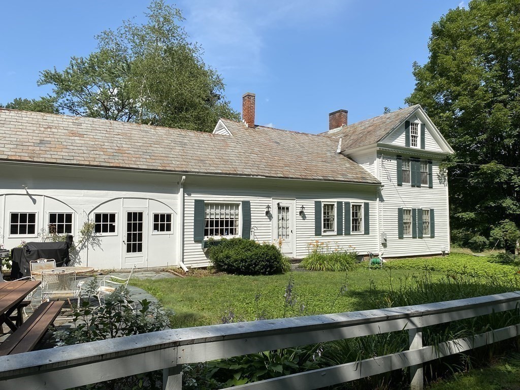 100 Brattleboro Road Bernardston, MA 01337 - Photo 3 of 42 a front view of a house with a yard