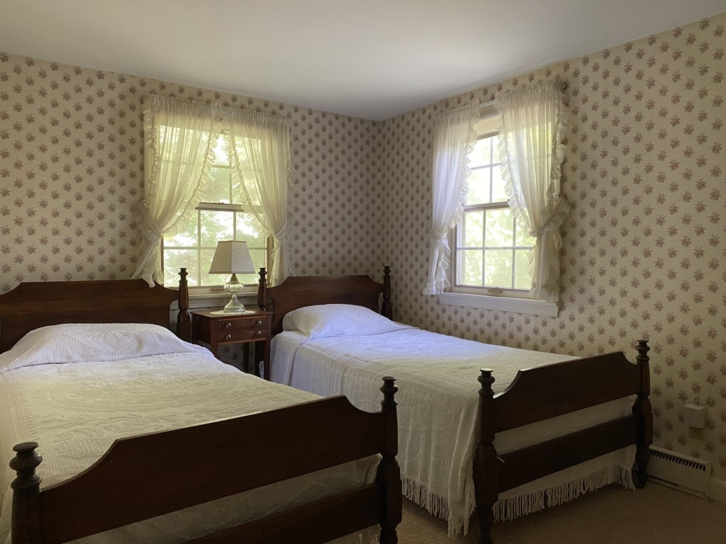 100 Brattleboro Road Bernardston, MA 01337 - Photo 31 of 42 a bedroom with two beds and a window
