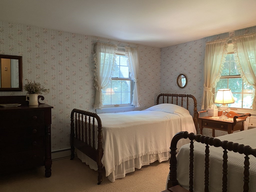 100 Brattleboro Road Bernardston, MA 01337 - Photo 32 of 42 a bedroom with a bed and a window