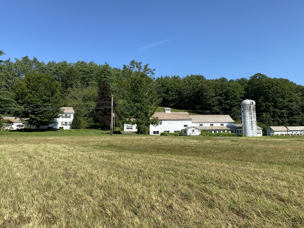 100 Brattleboro Road Bernardston, MA 01337 - Photo 36 of 42 a front view of a house with a yard