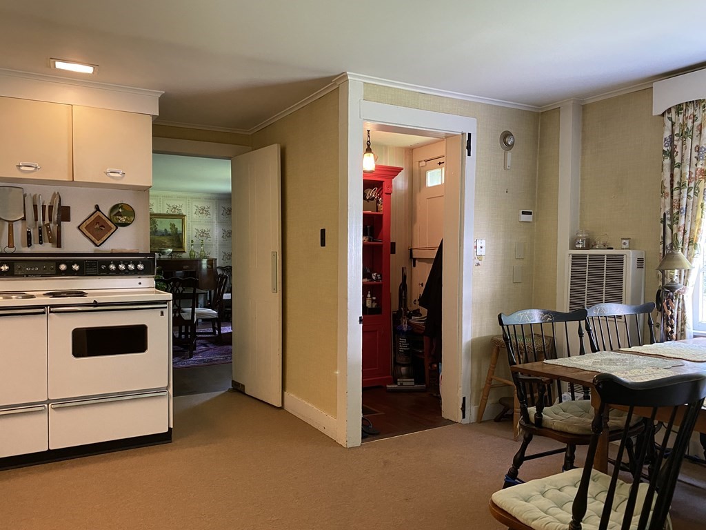 100 Brattleboro Road Bernardston, MA 01337 - Photo 9 of 42 a kitchen with stainless steel appliances granite countertop a stove and a refrigerator