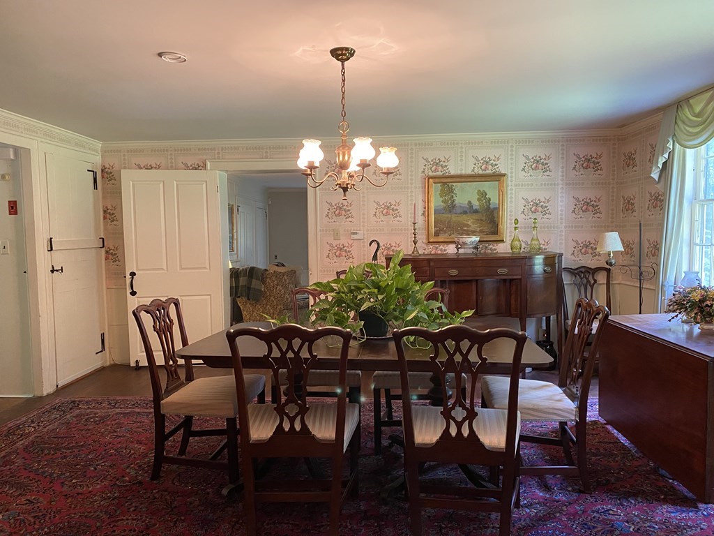 100 Brattleboro Road Bernardston, MA 01337 - Photo 10 of 42 a view of a dining room with furniture and chandelier