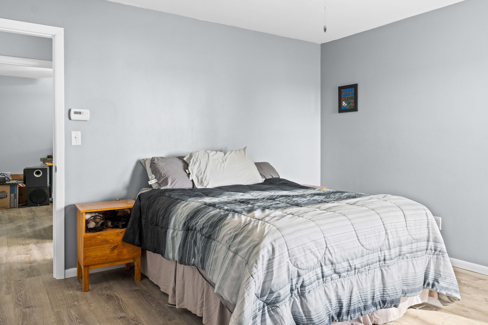 1579 West 2000S Road Kankakee, IL 60901 - Photo 17 of 24 a bedroom with a bed and a view of bathroom