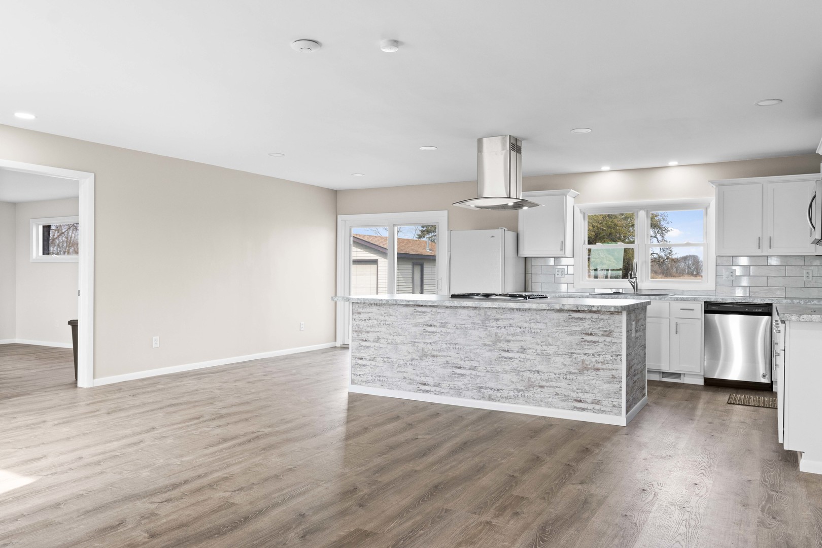 1579 West 2000S Road Kankakee, IL 60901 - Photo 6 of 24 a kitchen with white cabinets and counter