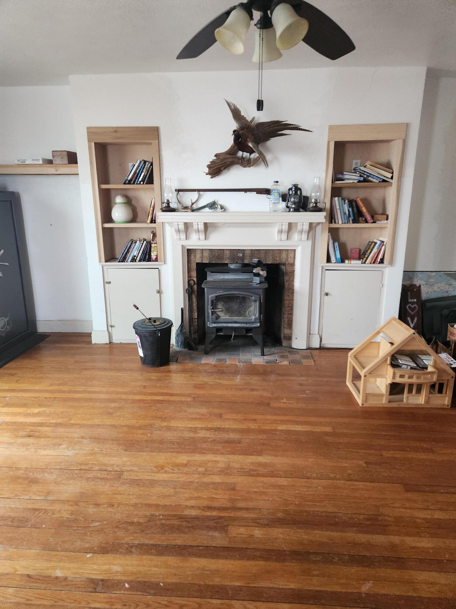 2409 Andres Road Belding, MI 48809 - Photo 11 of 19 living room fireplace