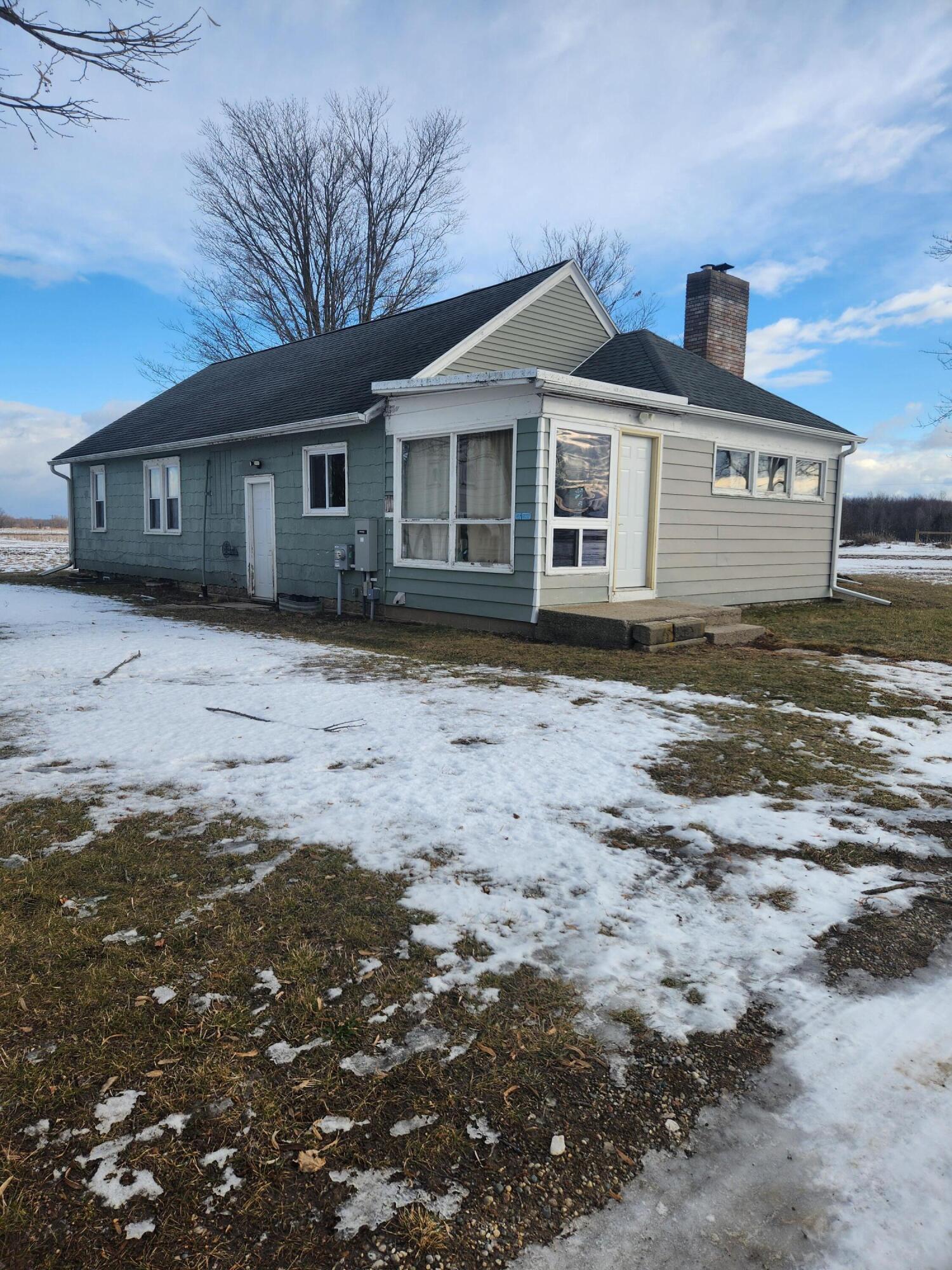 2409 Andres Road Belding, MI 48809 - Photo 2 of 19 side and rear view