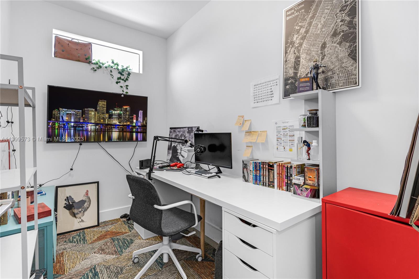 2936 Southwest 35th Avenue, Unit 2936 Miami, FL 33133 - Photo 11 of 22 a view of a workspace with furniture