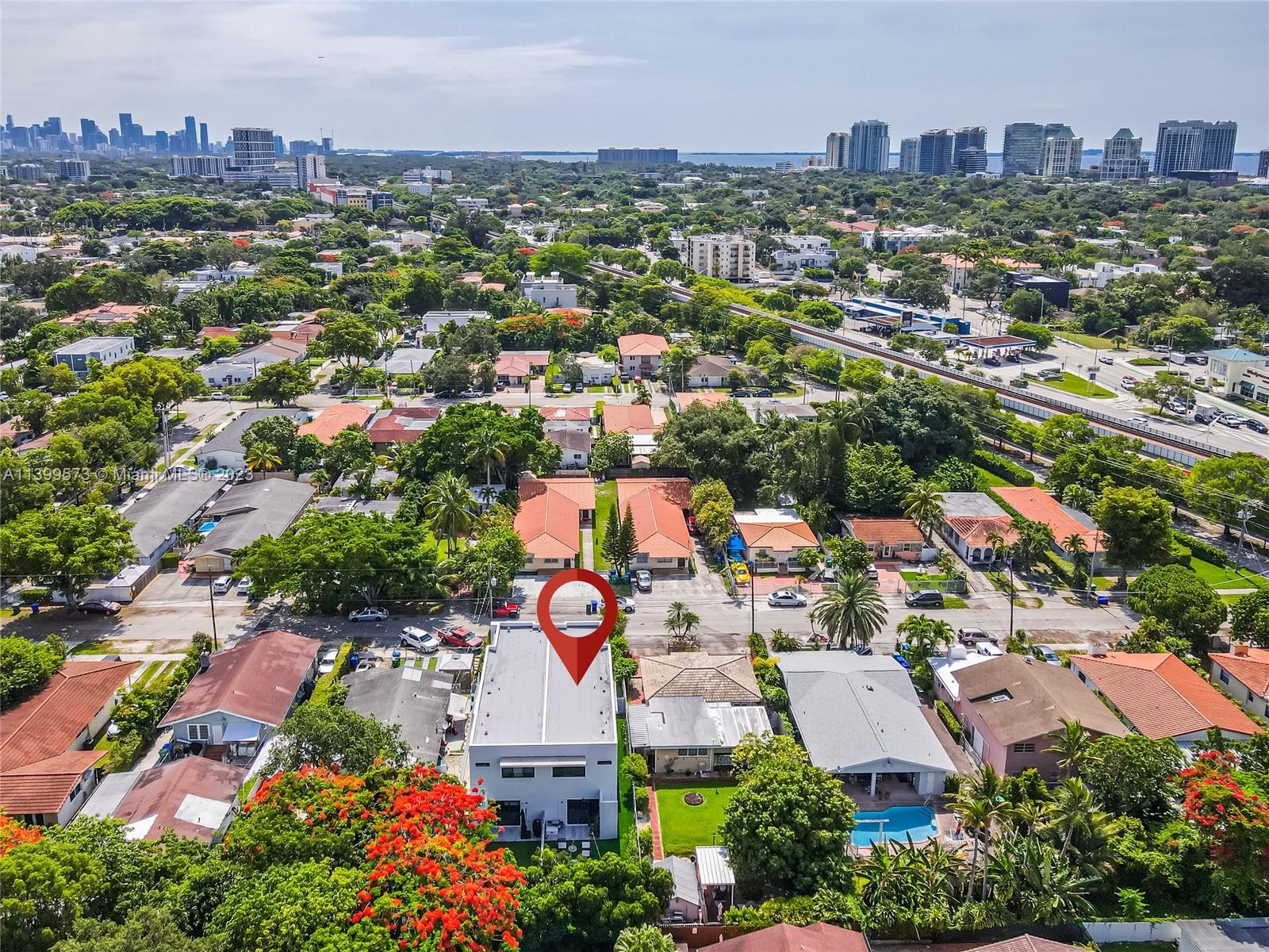 2936 Southwest 35th Avenue, Unit 2936 Miami, FL 33133 - Photo 18 of 22 an aerial view of a city