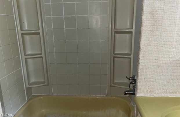 1220 Arner Road Chester, WV 26034 - Photo 14 of 24 Bathroom featuring vanity and tiled shower / bath