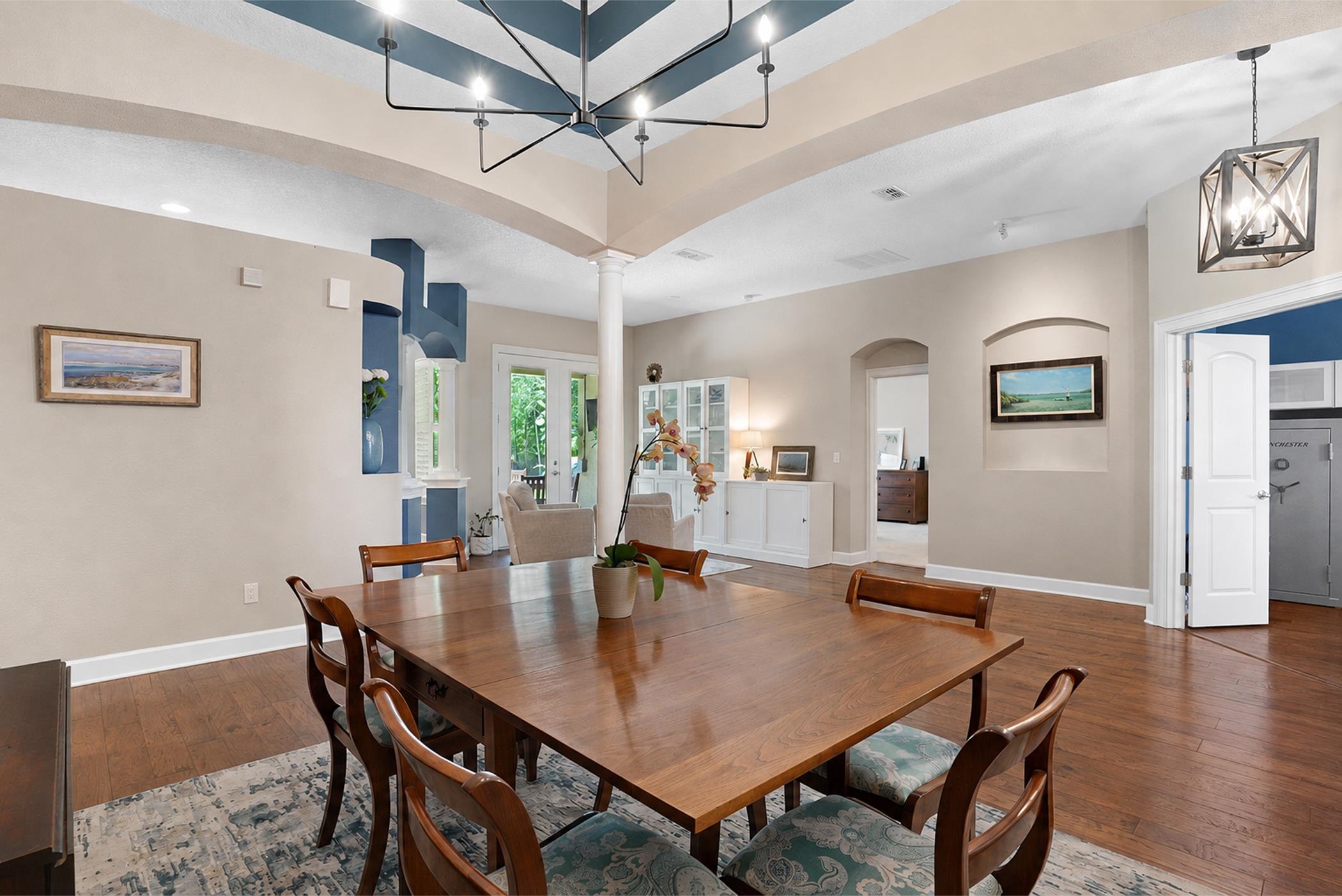 1308 Acorn Ridge Court St. Augustine, FL 32092 - Photo 6 of 47 a view of a dining room with furniture and wooden floor