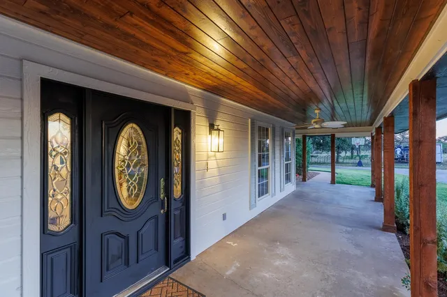 a view of a hallway with entryway