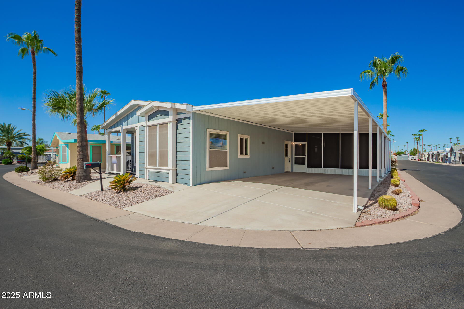 2929 East Main Street, Unit 217 Mesa, AZ 85213 - Photo 33 of 33 a front view of a house with patio