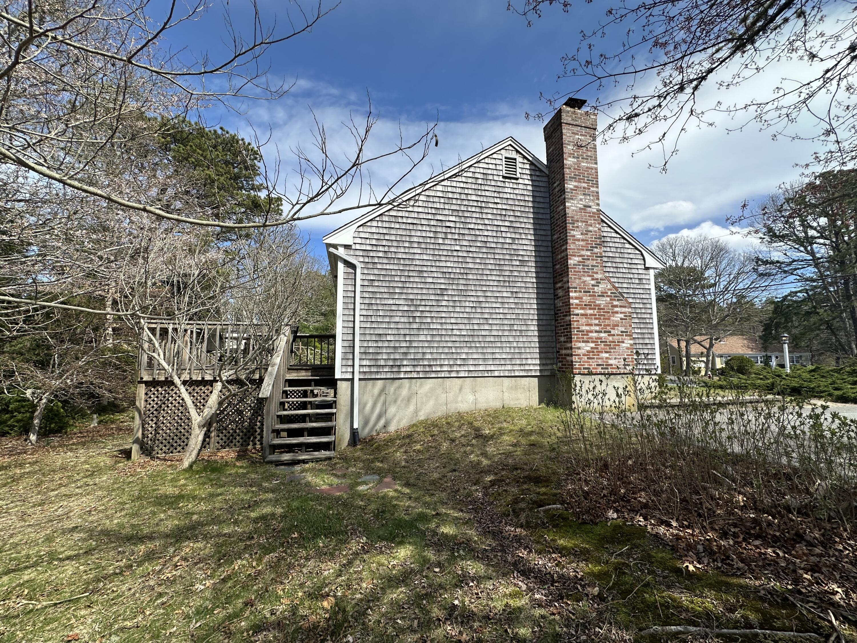 55 Cyprus Road South Dennis, MA 02660 - Photo 5 of 28 Left Side