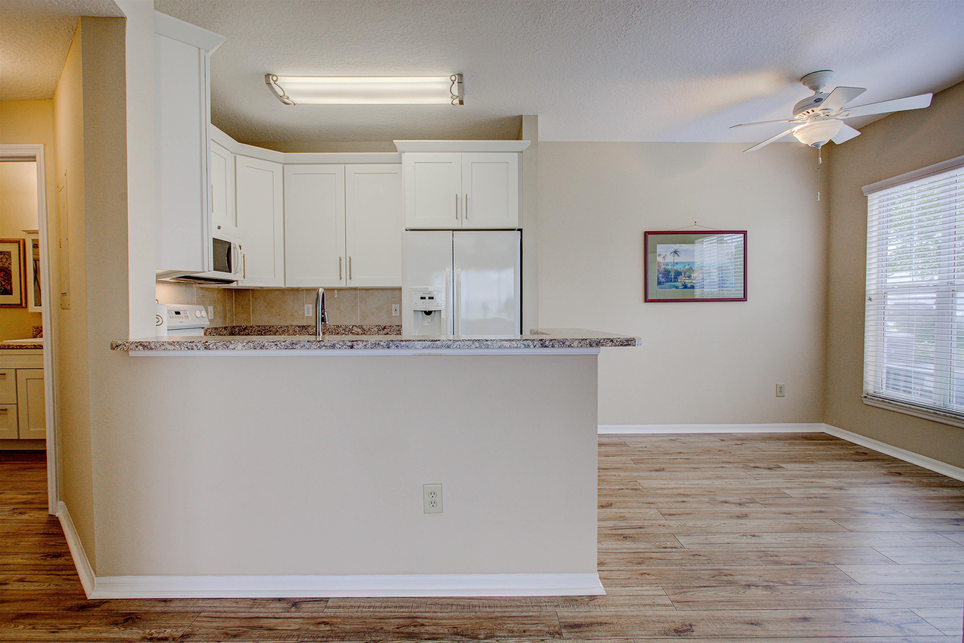 20102 Harbour Vista Circle St. Augustine, FL 32080 - Photo 11 of 31 a view of cabinets with wooden floor