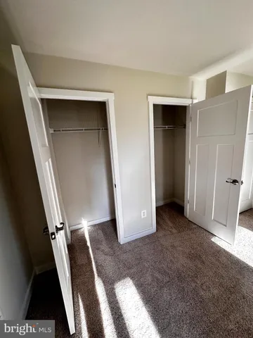 wooden floor in a hall with an entryway