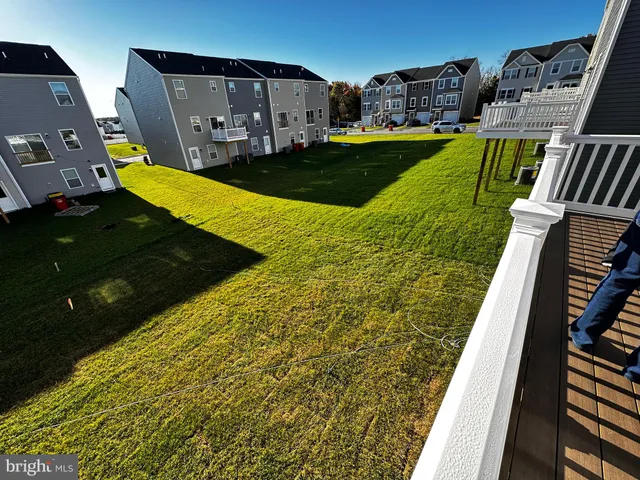 a view of balcony with furniture