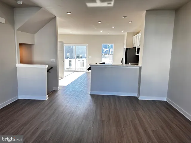 a bathroom with a toilet and a tub