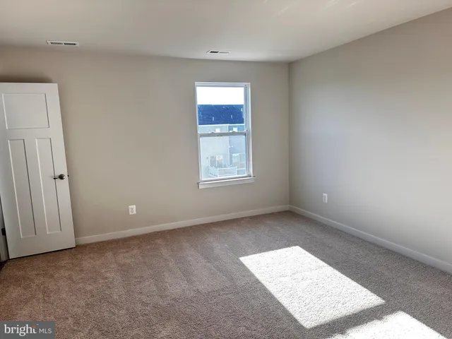 an empty room with closet