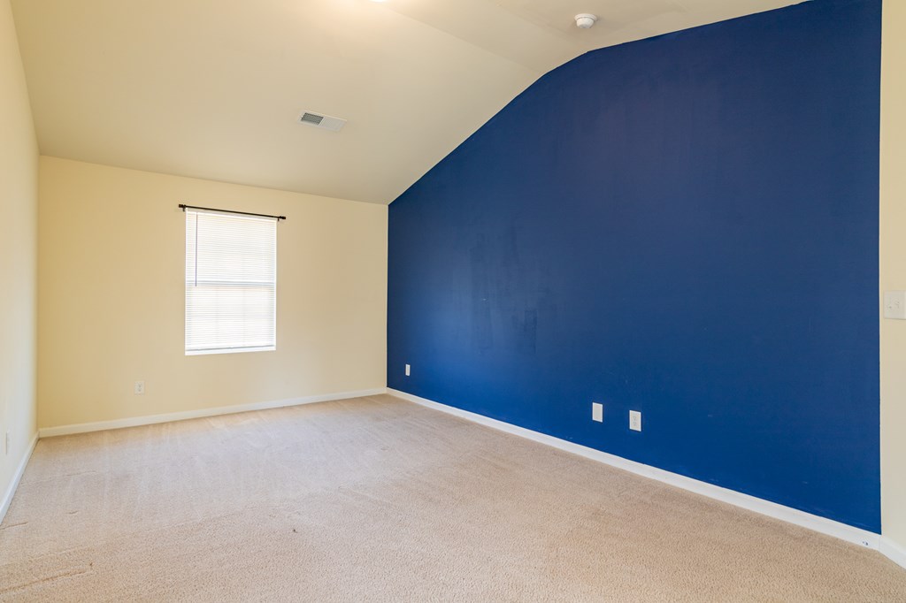 304 Irish Court Phenix City, AL 36869 - Photo 11 of 20 a view of an empty room with a window