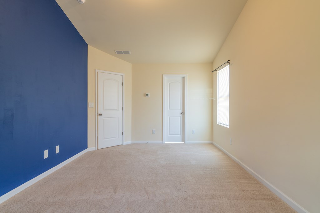 304 Irish Court Phenix City, AL 36869 - Photo 14 of 20 a view of an empty room with a window