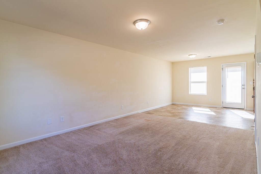 304 Irish Court Phenix City, AL 36869 - Photo 4 of 20 an empty room with a windows and closet
