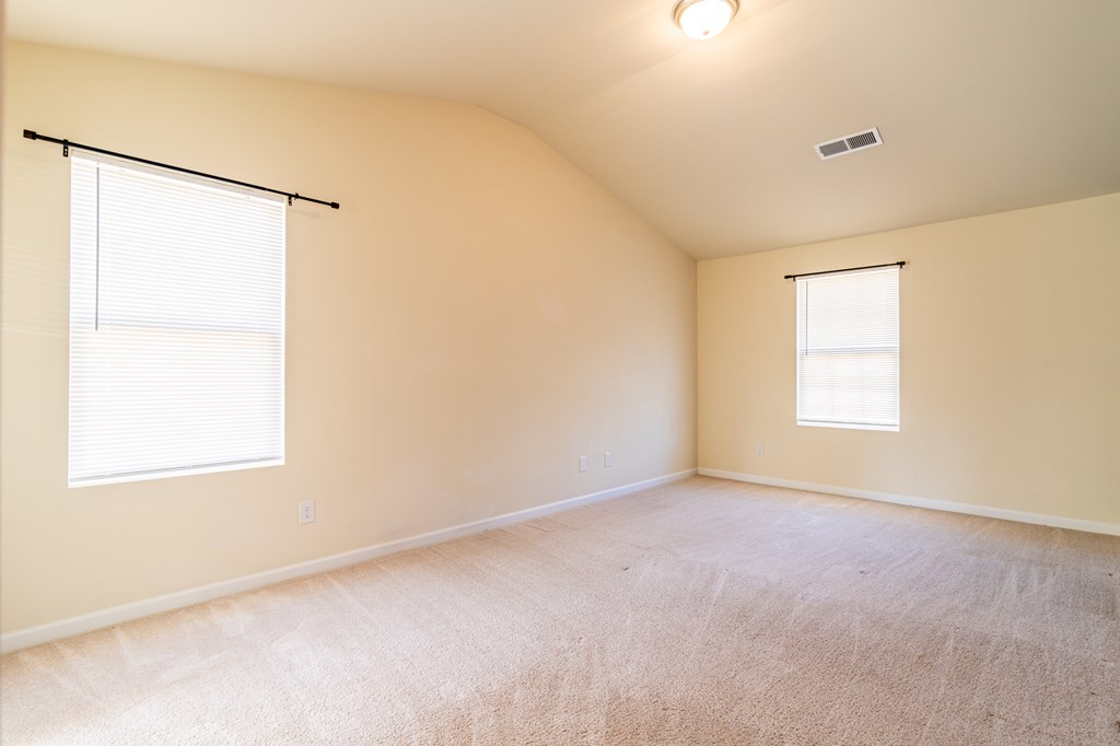 304 Irish Court Phenix City, AL 36869 - Photo 10 of 20 a view of an empty room with a window