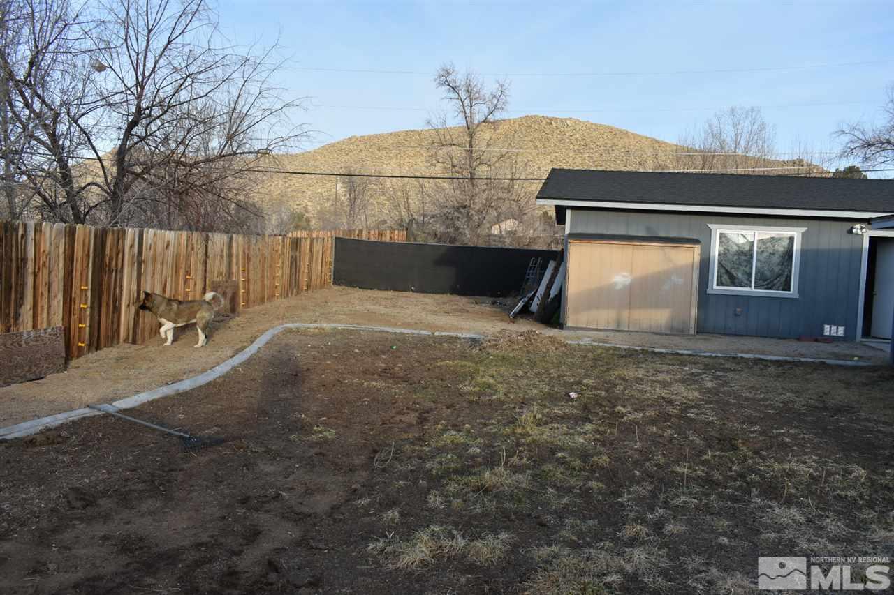 9355 Pagoda Way Reno, NV 89506 - Photo 11 of 18 a view of backyard with wooden fence
