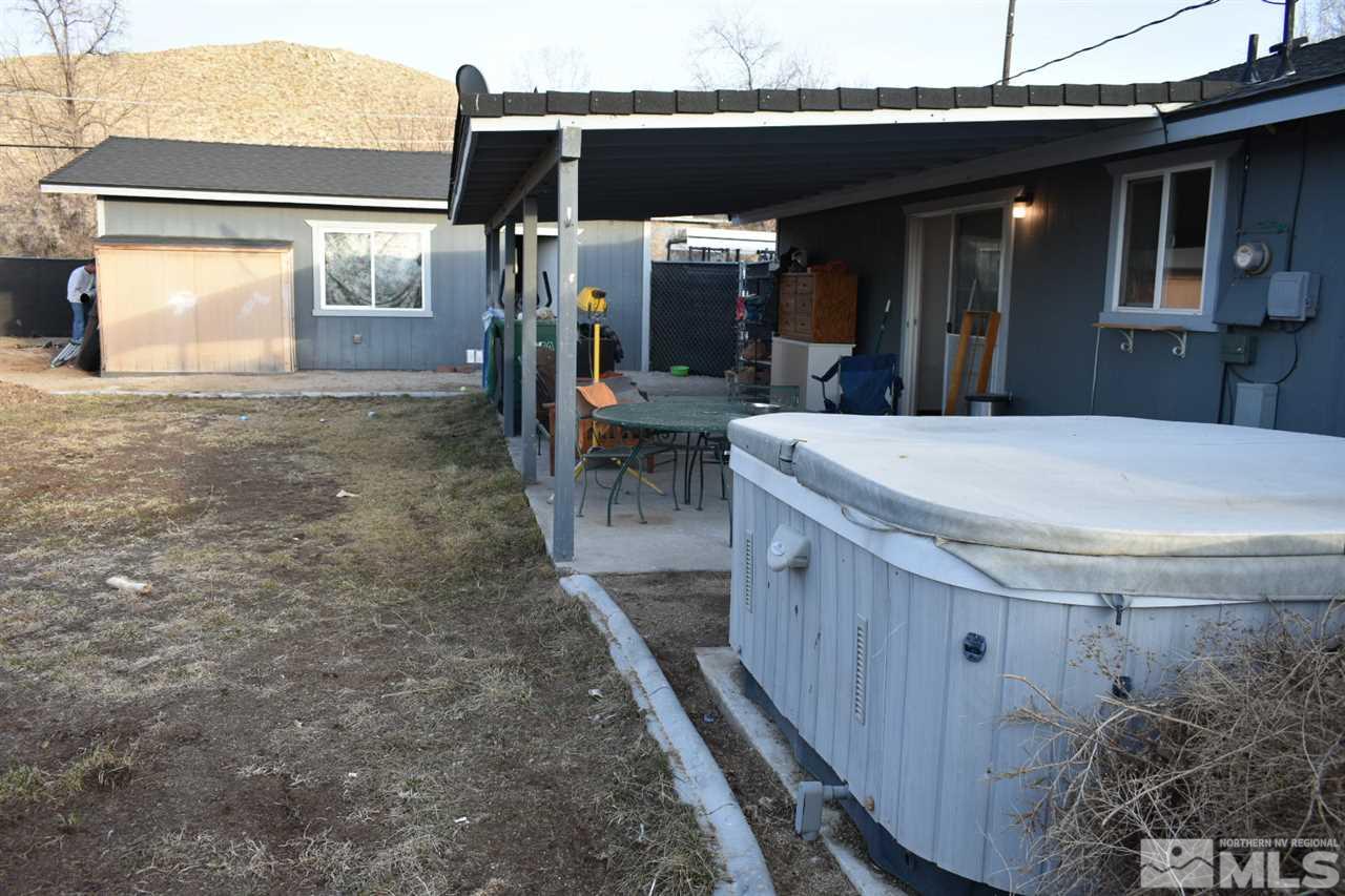 9355 Pagoda Way Reno, NV 89506 - Photo 12 of 18 a view of a house with backyard and porch